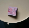 Could the Canadian Dollar Hit a Record Low if the U.S. Imposes 25% Tariffs?